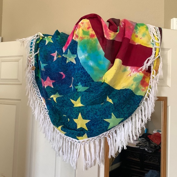 Large round tie dyed flag tapestry.